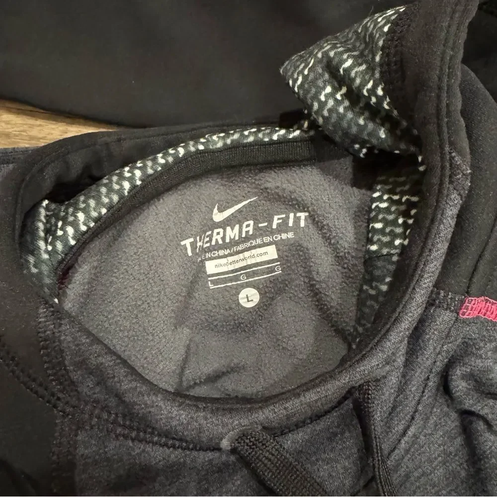 Nike women’s Black and Dark Gray Sweater with Pink Accents